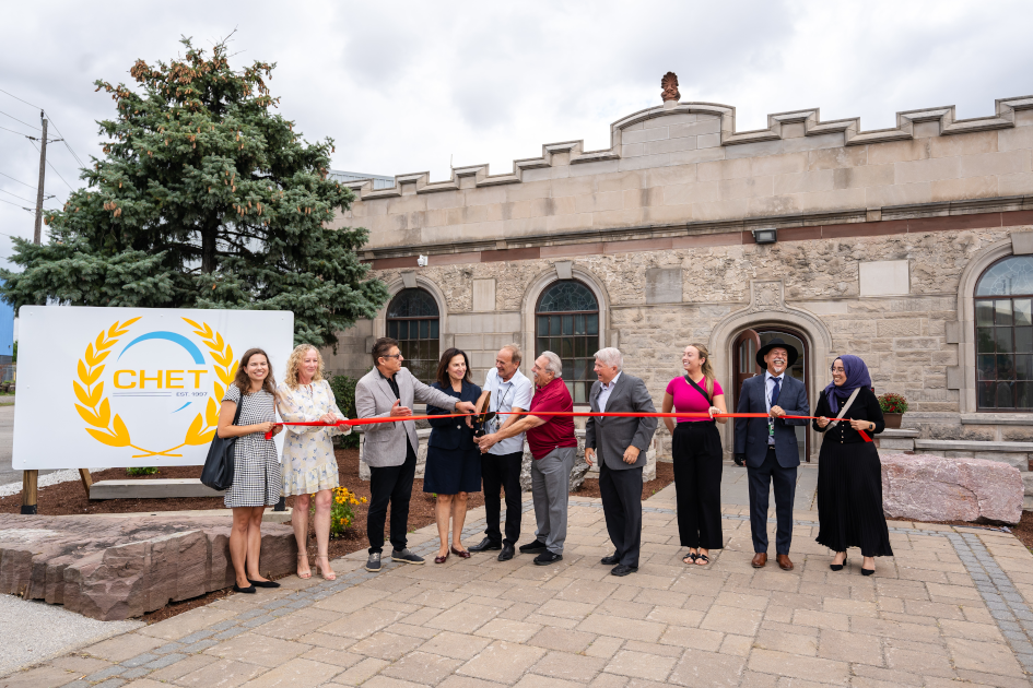 Pre-ribbon cutting in front of the new campus.