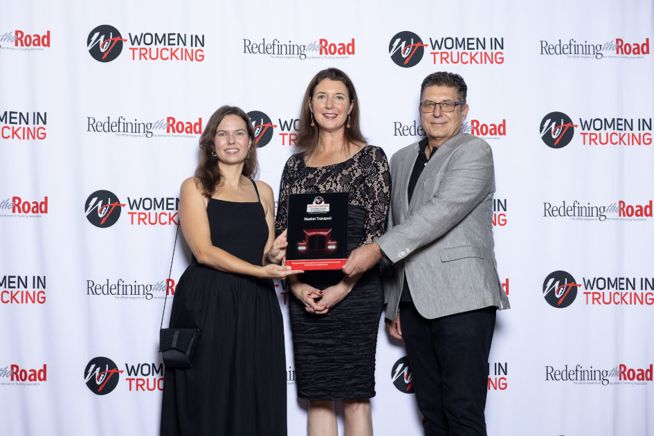 Musket Transport receiving Top Company for Women to Work in Transportation award.